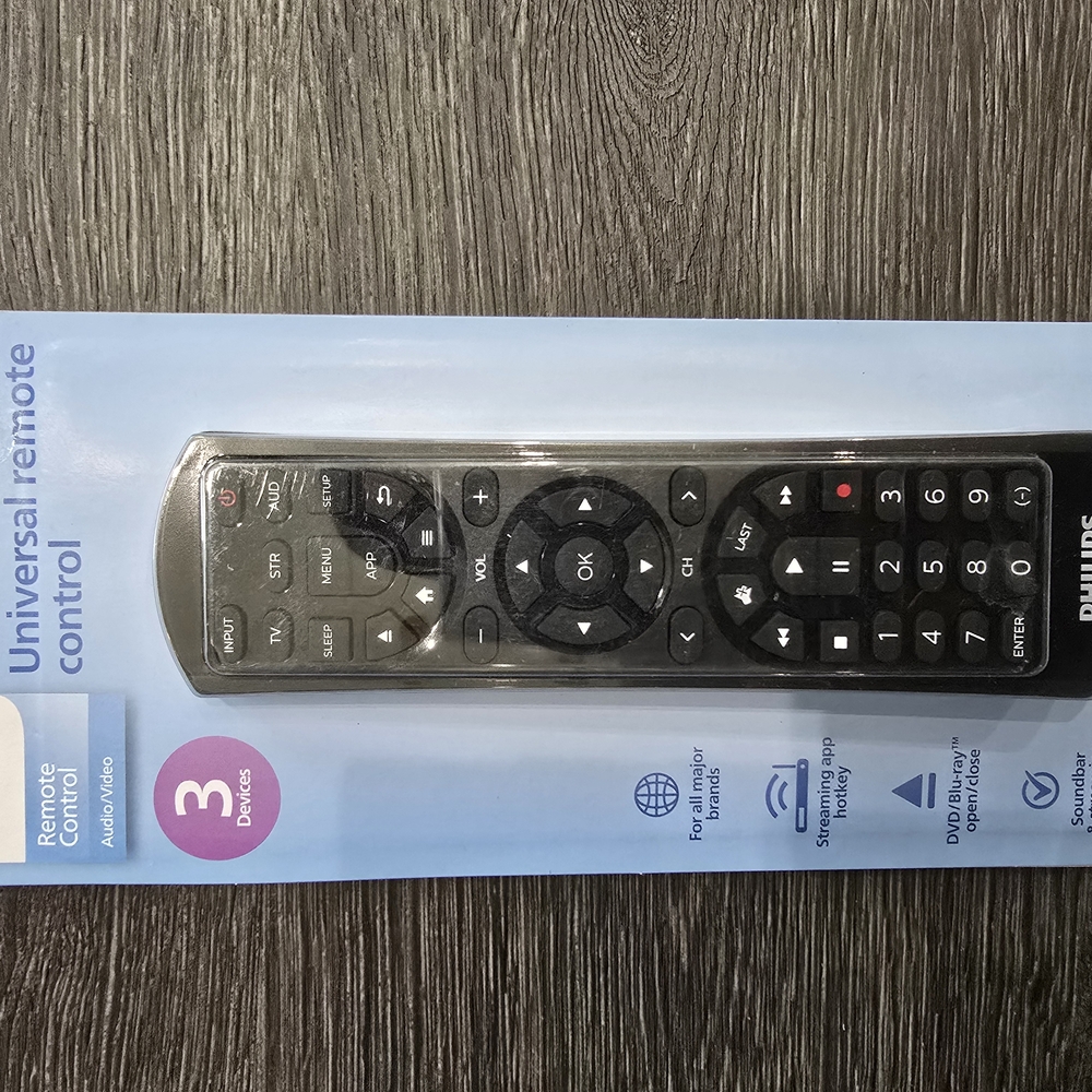 Black Streaming Device Remote Control Slim Elongated Sealed Packaging